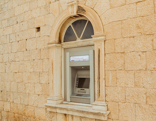 ATM where person can buy euros in Europe