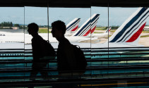 How do you get from Charles de Gaulle to Paris without spending too much?