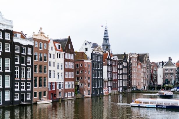 colorful homes beside a canal