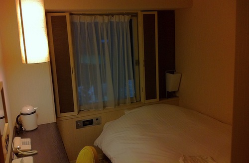 Tiny, dark Hotel Room